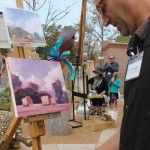 Artists create work during previous Passport to the Arts events.