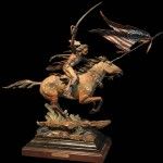 Ed Natiya, Final Charge, bronze, 30 x 36 x11 D.