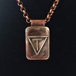 Kathi Turner, T within V Custom Branding Pendant, copper/sterling silver.